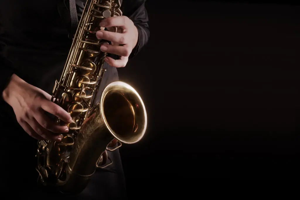 Saxophone player Saxophonist playing jazz music instruments